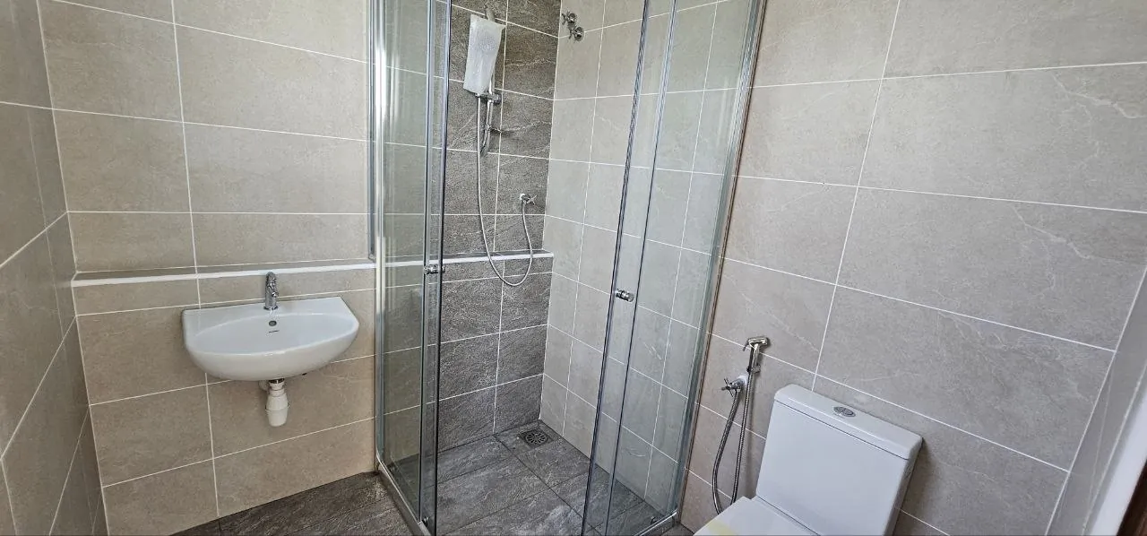 Pinggiran Pengkalan Bayu bathroom with glass shower screen
