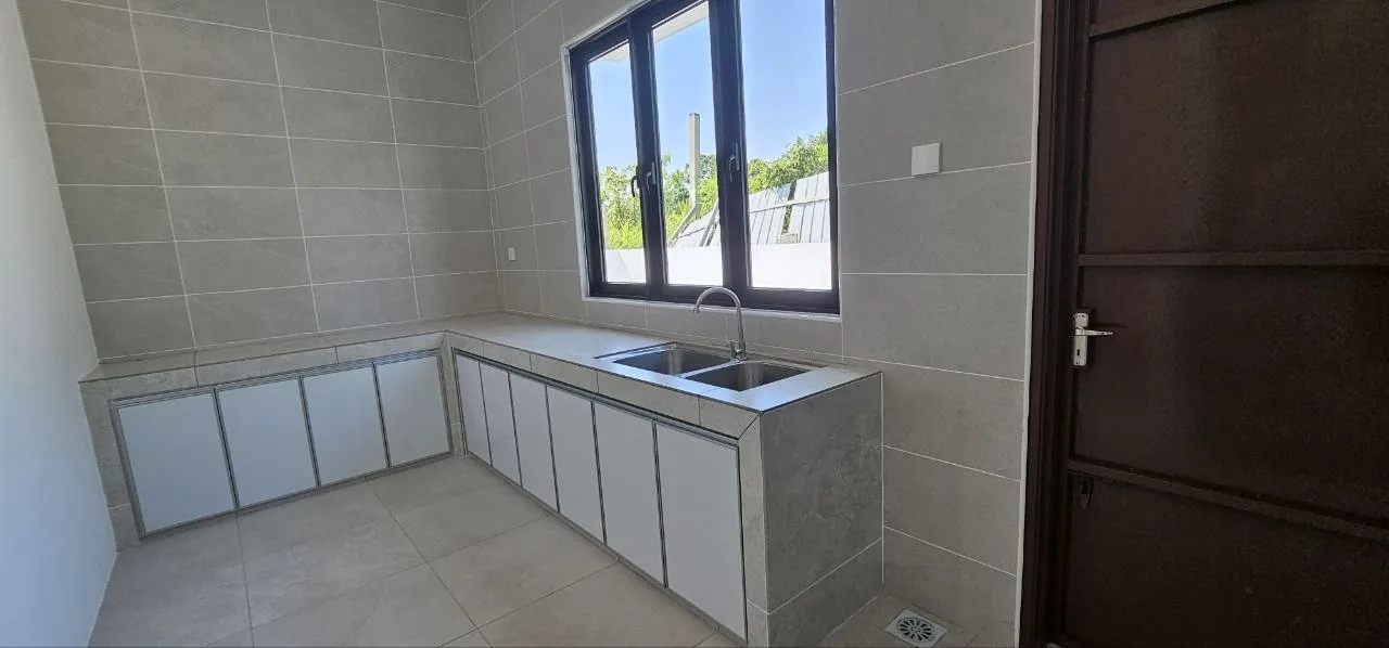 Pinggiran Pengkalan Bayu kitchen with sink and cabinet base