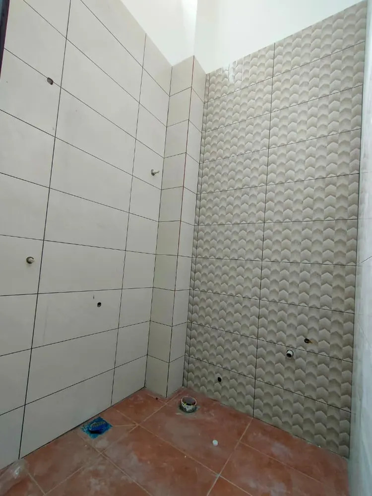 Second bathroom, shower area