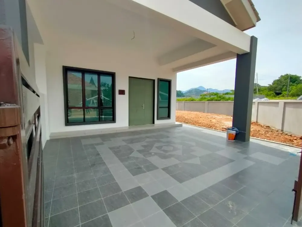Car porch and entrance, looking out towards the limestone hills