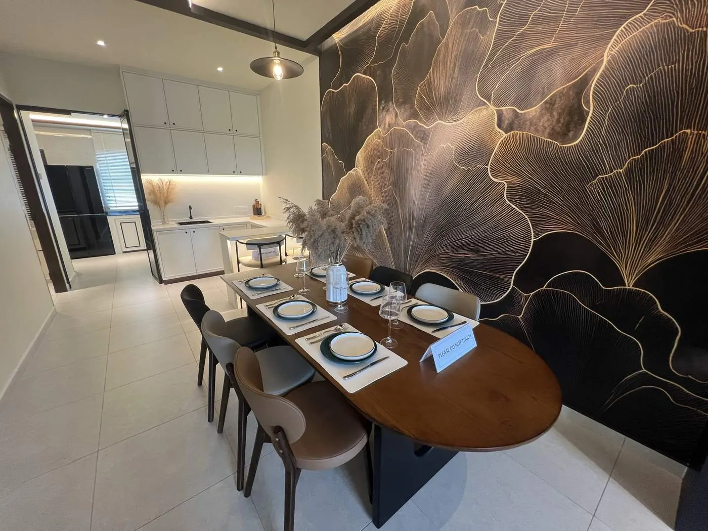 Dining area with feature wall in the Pearl Garden Phase 3 show unit