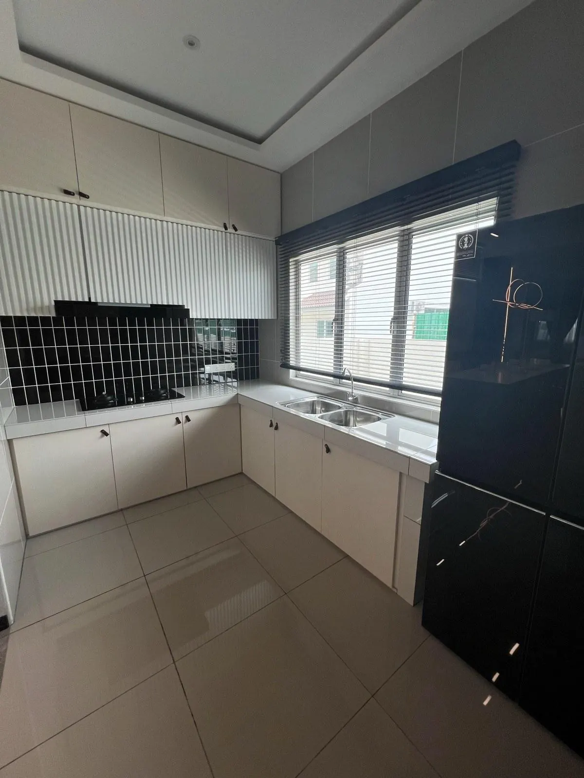 Wet kitchen of the completed double storey Pearl Garden show unit